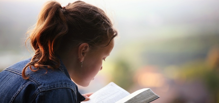 Young Man Reading Bible